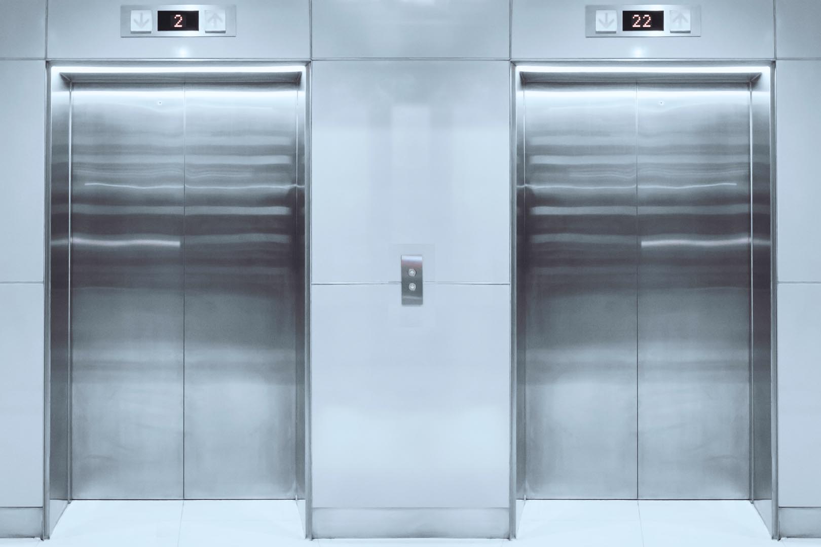 modern elevator with closed doors in lobby